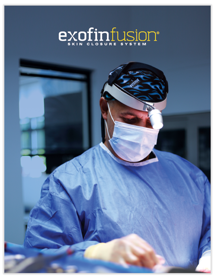 Image of Surgeon with mask and headlamp in an operating theater.